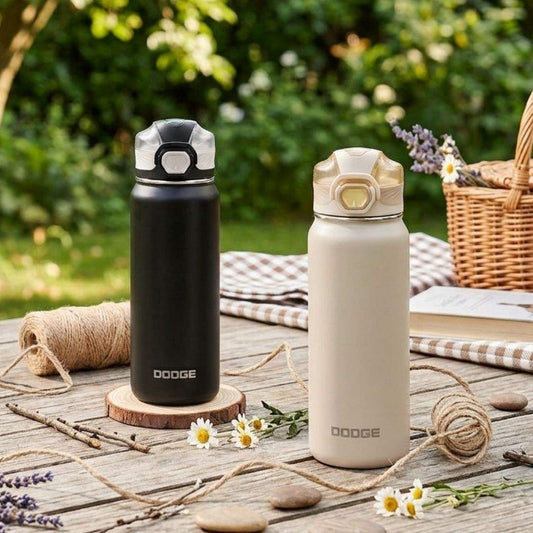 Dodge Chill 700 stainless steel insulated water bottle with push-button lid and fabric handle in black and beige.