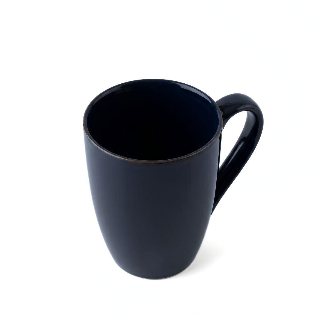 Navy blue porcelain Eclipse coffee mug with comfortable handle and glossy finish, perfect cozy coffee mug for home or office.