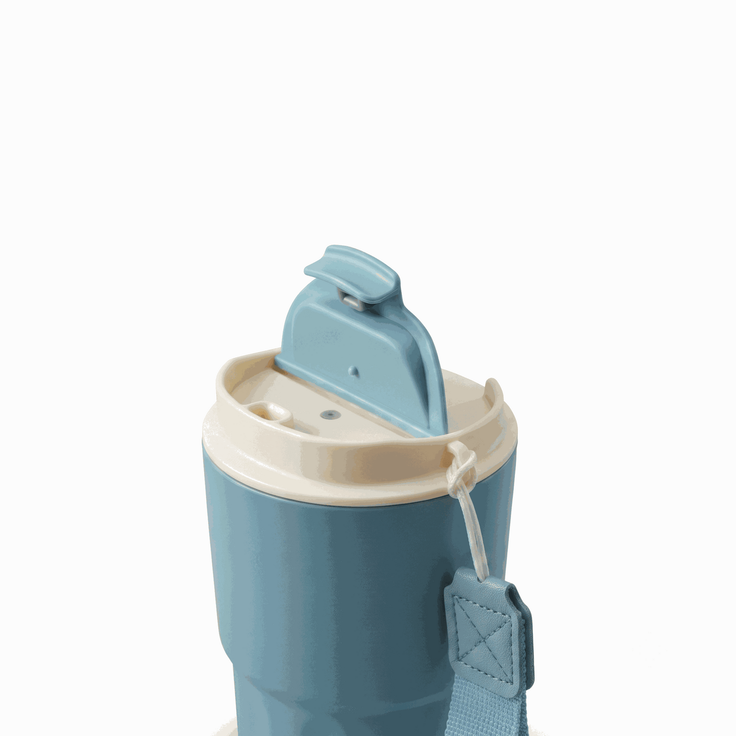 Blue Wander Grip Mug Pro travel mug with grooved stainless steel body and fabric handle for insulated coffee on the go