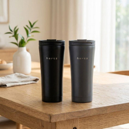 Matte black Nertz On the Go 600ml stainless steel insulated tumbler with leak-proof flip lid for hot and cold drinks.