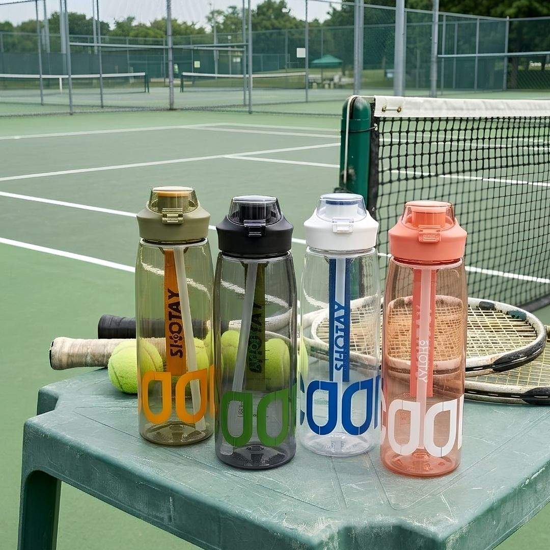Nertz Wave high-capacity water bottle with flip-top lid and ergonomic grip in pink