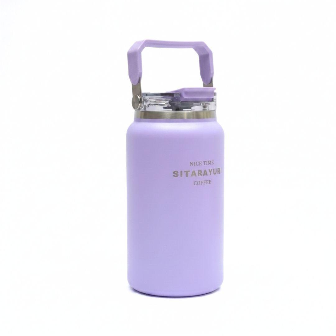 Blue HydroVault water bottle with stainless steel body, flip-top lid, built-in straw, and carry handle for leak-proof hydration