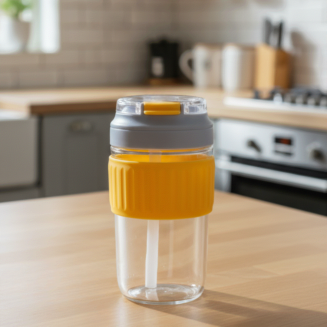 Nertz Crystal Grip Mug with silicone grip, dual lids, and clear borosilicate glass design