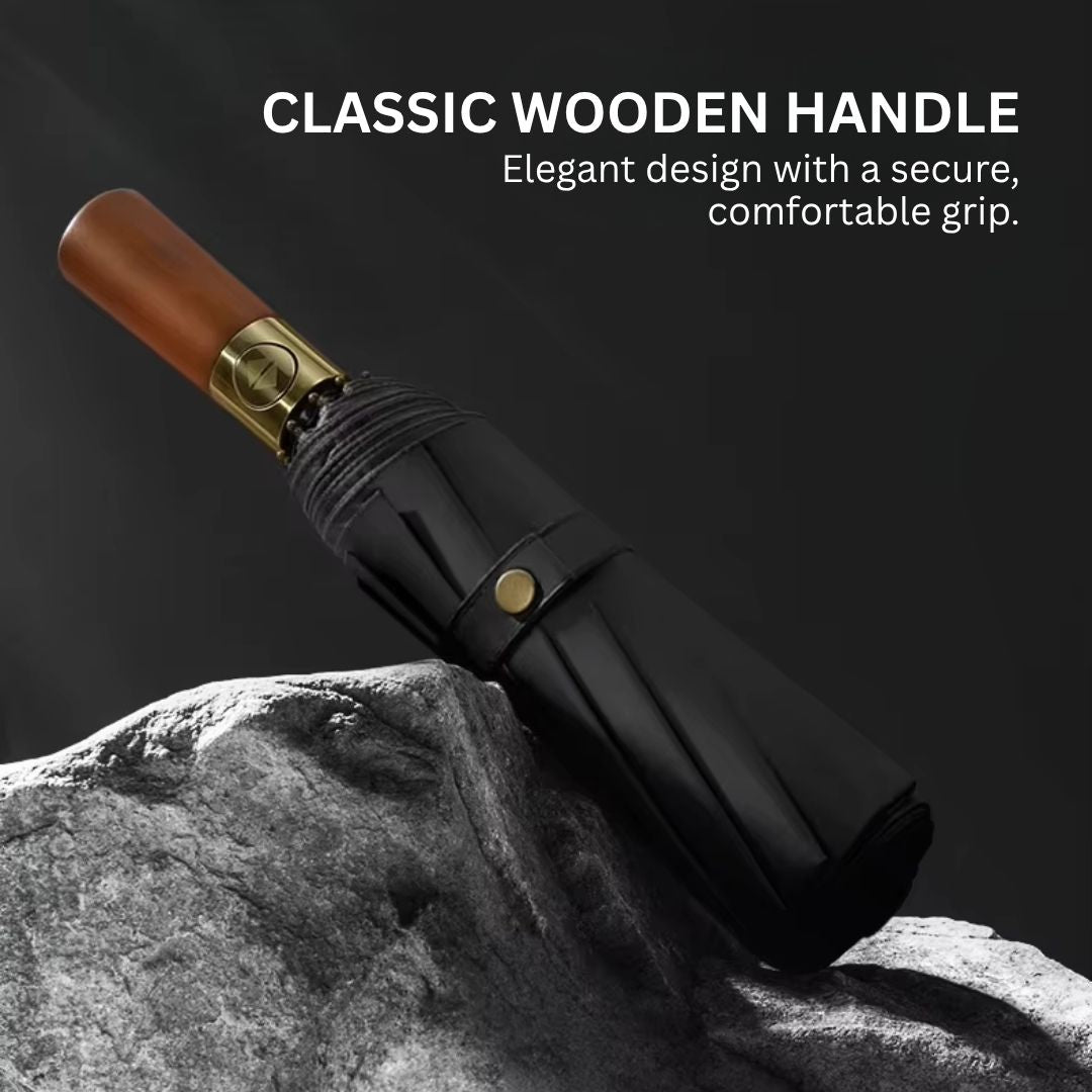 NertZ.in Royal Shield umbrella with a classic wooden handle resting on a rock