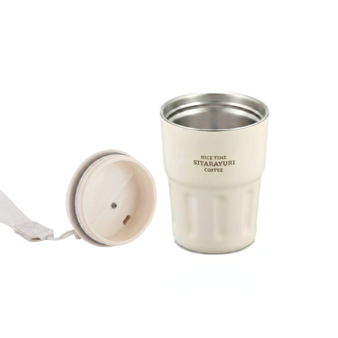 Easy to clean Wander Grip Mug stainless steel travel mug with grooved grip, flip-top lid, and fabric handle for spill-free, insulated coffee on the go