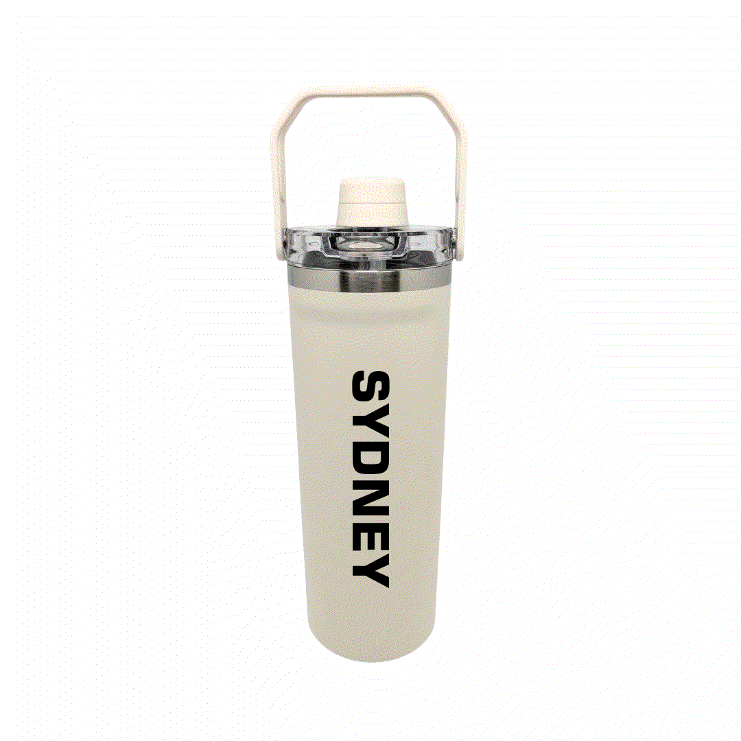 NertZ.in Travel with Nertz Edition tumbler, cream colored with SYDNEY printed vertically in black