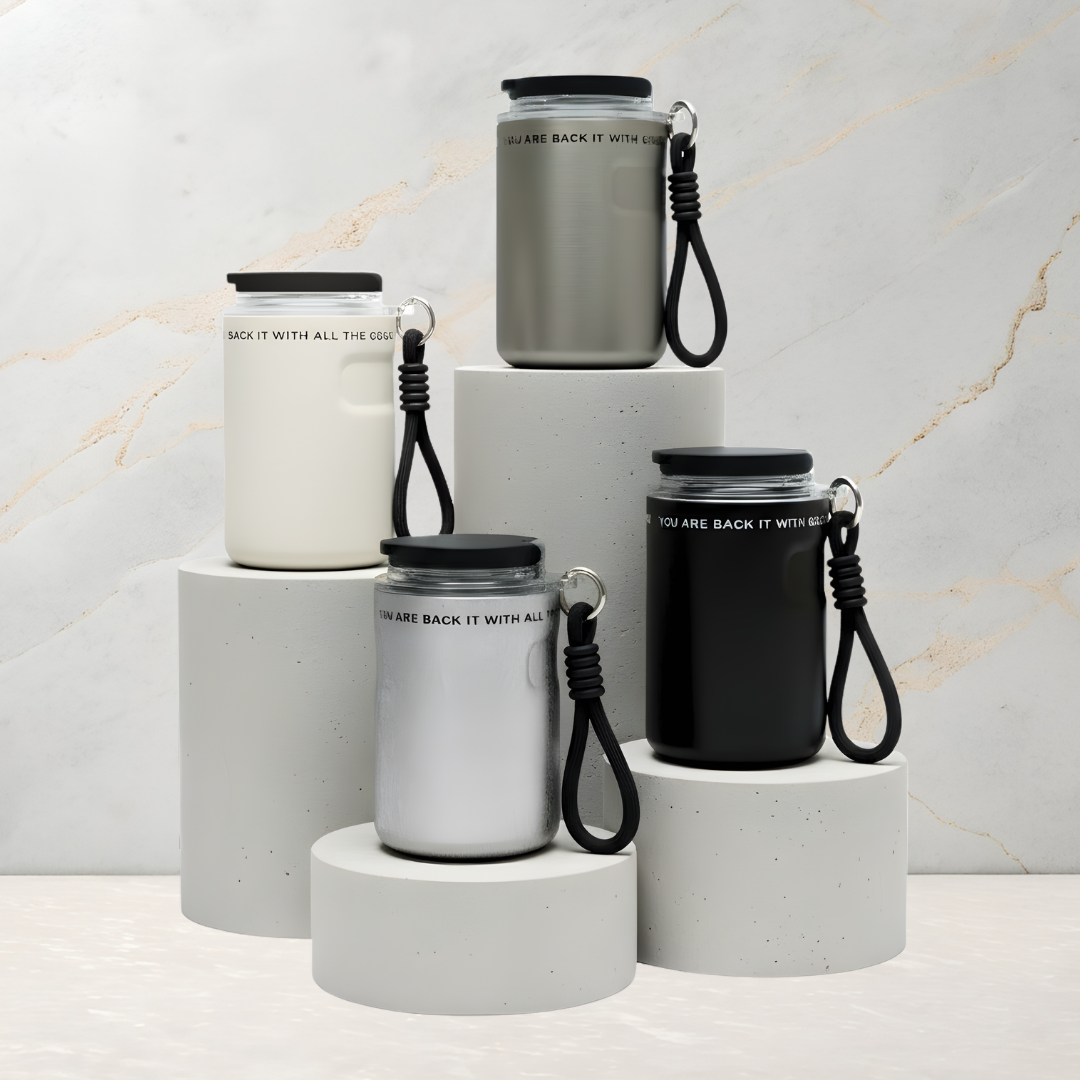 Brew Grip stainless steel insulated travel mug with fabric handle and flip-top lid