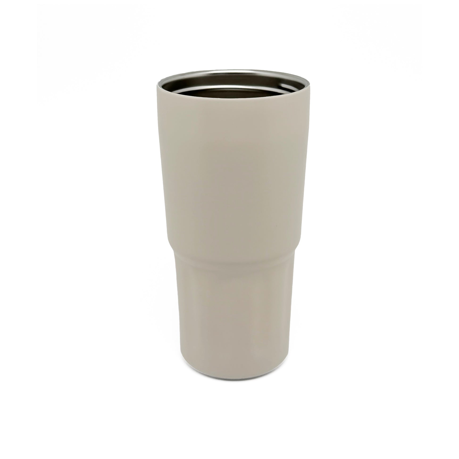 NertZ.in Nertz Drift tumbler in a light beige color with a silver rim